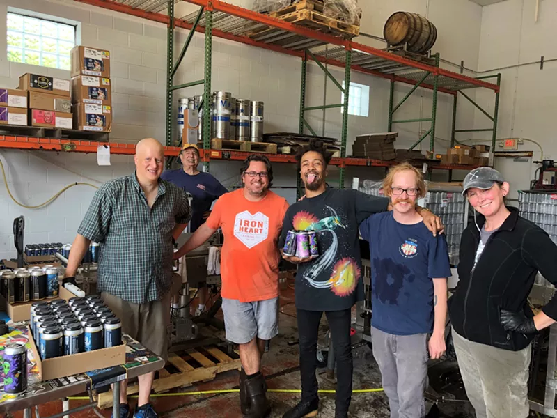 Jonny Goood (middle) with one of Full Pint's owners Barrett Goddard (orange shirt) and a few members of the Full Pint Brewery team - PHOTO: MONTANA EFAW