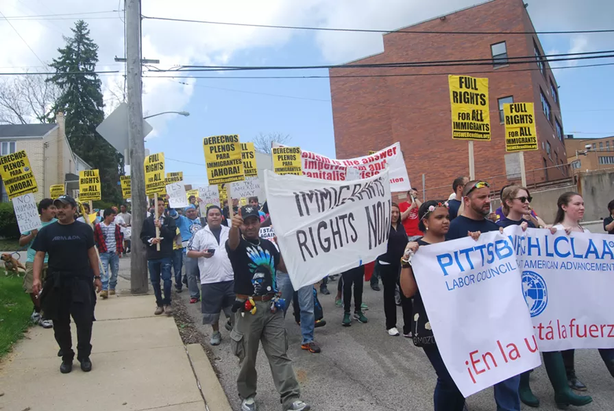 Martin Esquivel-Hernandez marching in an immigrants' rights rally on May 1 - PHOTO BY RYAN DETO