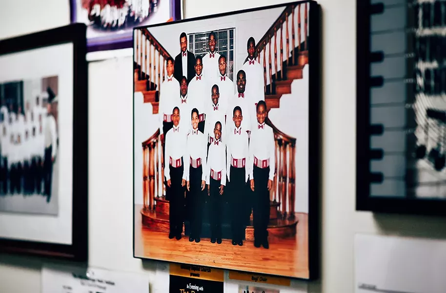 A photo of Joseph Hall (center) when he performed in the boys' choir hangs on a wall at the Afro American Music Institute. - CP PHOTO BY SARAH HUNY YOUNG