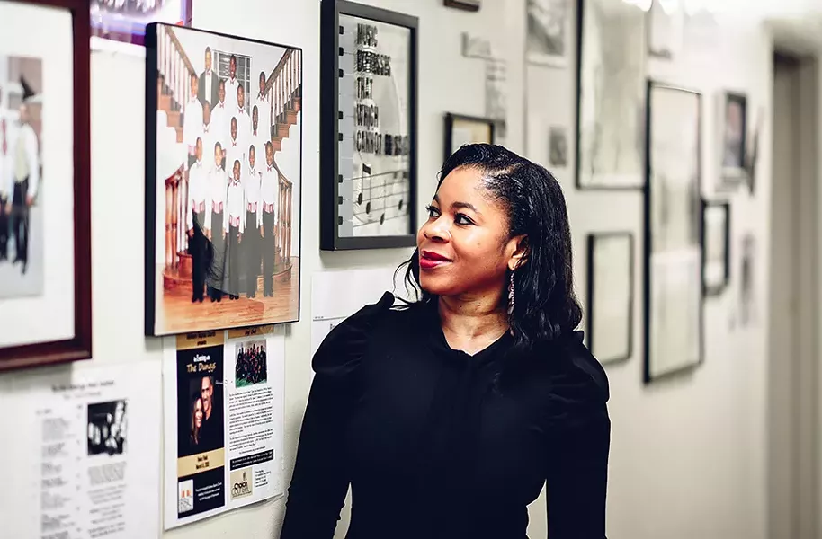 Cecilia Coleman looks at a photo of her son that's hung on the wall of the Afro American Music Institute, which her parents founded in 1982 - CP PHOTO BY SARAH HUNY YOUNG