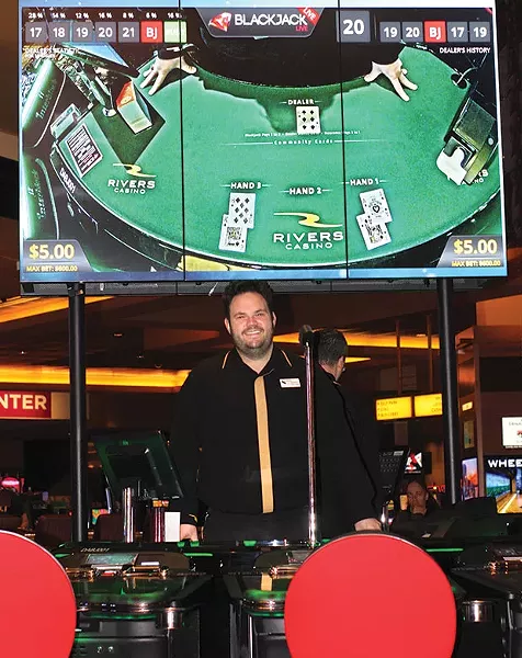 Dealers get ready to go at the Rivers Casino Rush Table Zone. - CP PHOTO BY CHARLIE DEITCH