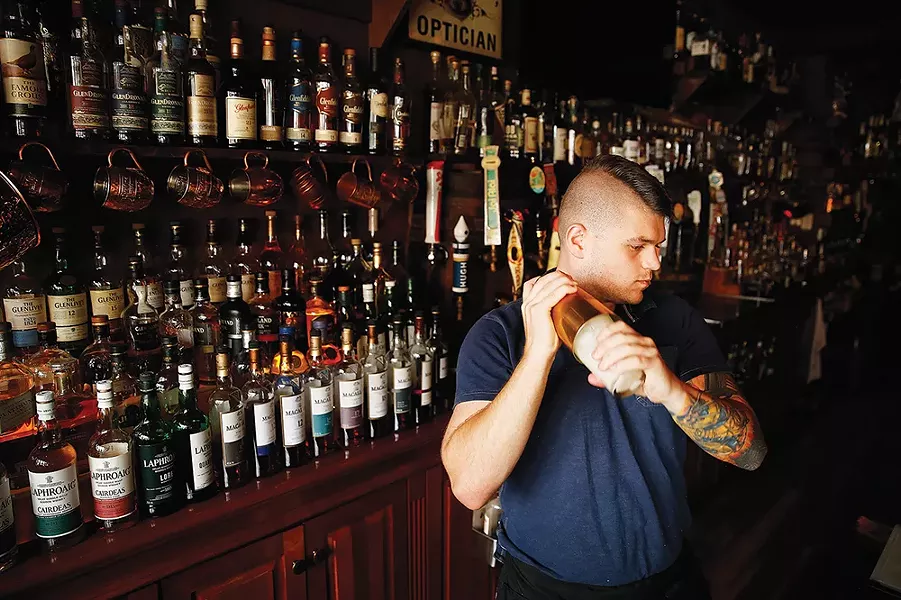Carmella's Pints & Plates bartender Jackson Allen - CP PHOTO BY JARED WICKERHAM
