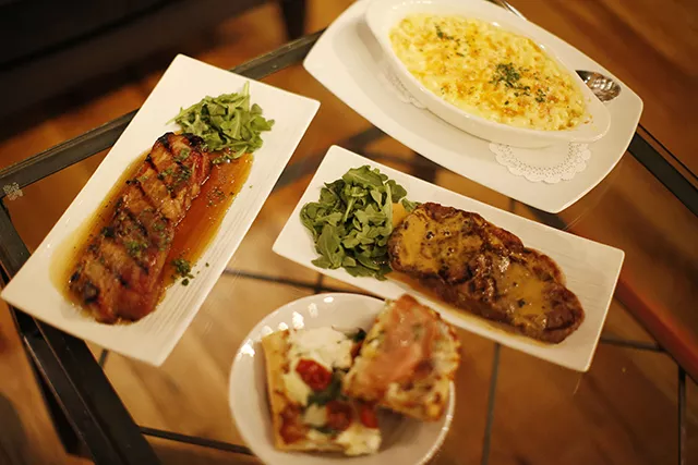 Pork belly, sirloin steak, macaroni and cheese, and an assortment of pizza at PA Market - CP PHOTO: JARED WICKERHAM
