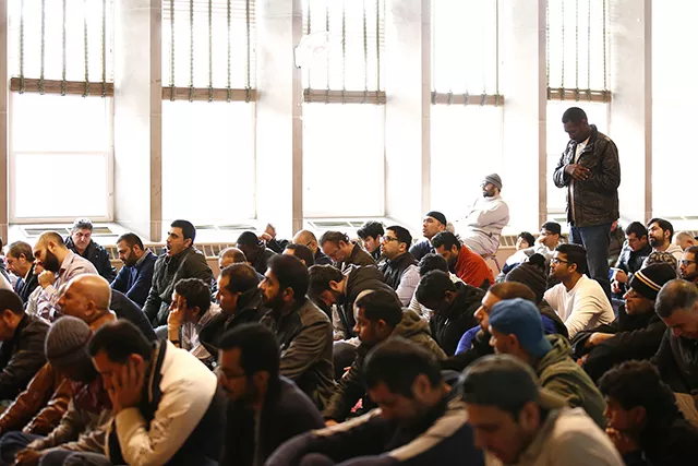 Members of the Islamic Center of Pittsburgh pray during service. - CP PHOTO: JARED WICKERHAM