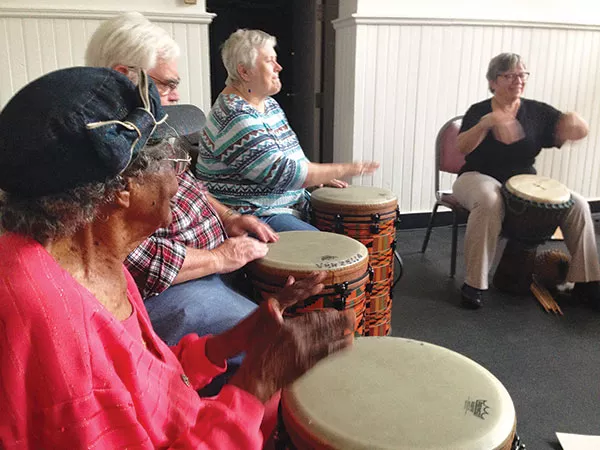 Market House seniors join a drum circle at the center. - JENNIFER SZWEDA JORDAN