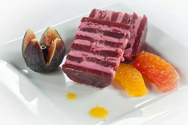 Beet timbale, with goat cheese and caramelized-onion apples; blood orange; and fig and blueberry - PHOTO BY HEATHER MULL