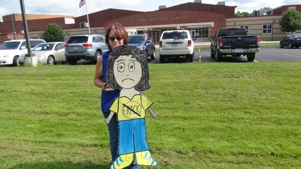 Parents rallied in July in front of the Mars Area School District campus, where unconventional natural gas drilling development could take place less than a mile away - PHOTO BY ASHLEY MURRAY