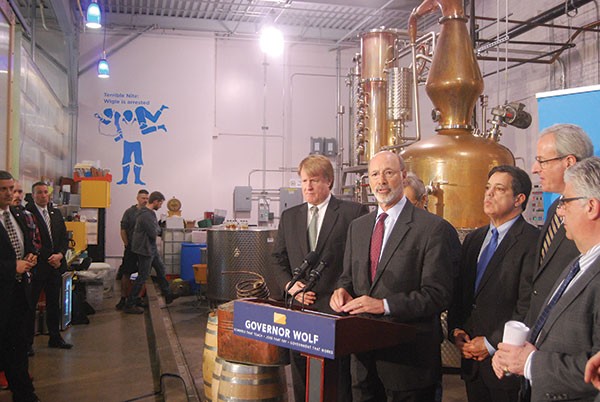 From left, Allegheny County Executive Rich Fitzgerald, Gov. Tom Wolf, state Sen. Jay Costa and state Rep. Dan Frankel at Wigle Whiskey in March