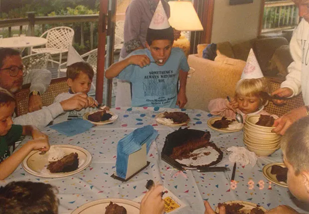 The author at around age 3, eating birthday cake with her cousins - PHOTO COURTESY OF SUELLEN ROBERTS