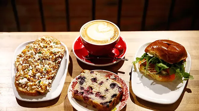 Chevre and fig jam toast, a latte, blueberry banana bread, and halloumi from De Fer Coffee & Tea