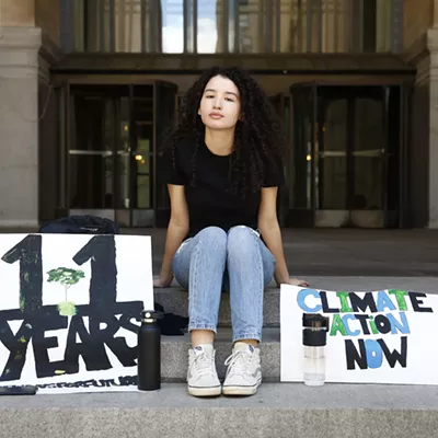 Leandra Mira on the steps of the City-County Building