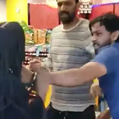 Screencap from video of a violent altercation at a gas station in Marshall-Shadeland