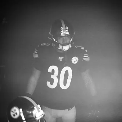 James Conner waits to take the field inside the tunnel for introductions.