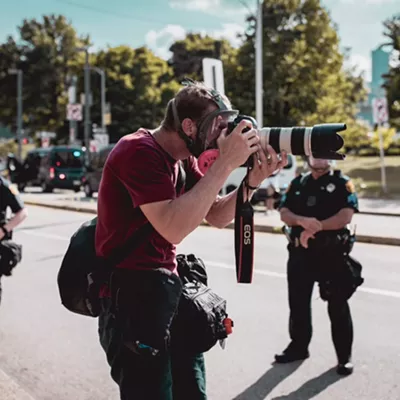 Photojournalist Jared Wickerham covering a "Civil Saturday" protest downtown on July 4, 2020