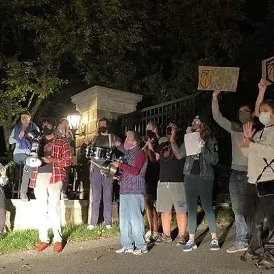 Activists rally outside Sewickley home of Sen. Joe Manchin&rsquo;s daughter in support of reconciliation bill