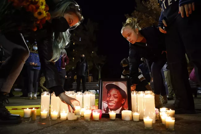 Community members honor Jim Rogers with candlelight vigil on anniversary of his death - Vimarsana News