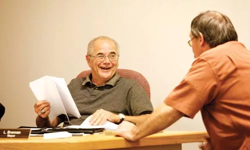Verona Mayor Leonard Brennan talks with police chief Guy Truby at an Oct. 14 borough council meeting. - HEATHER MULL