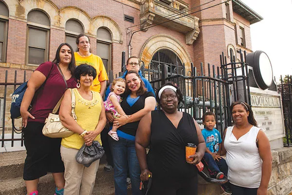 Woolslair parents believe a STEAM magnet program could save their school. Pictured from left: (front) Barb Squires, Valerie Allman and daughter Lily, Tommy Jeter, Jaline Cunningham and son Jaivin, (back) Donna Harper, Bertha Weimer, Christine