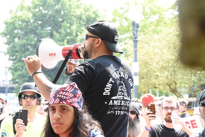 Joey Gibson talks to his crowd before they started marching