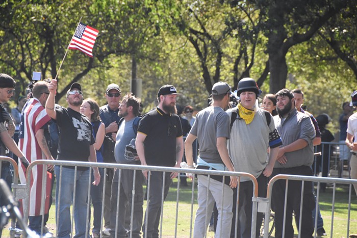 Patriort Prayer supporters in their fenced-in area