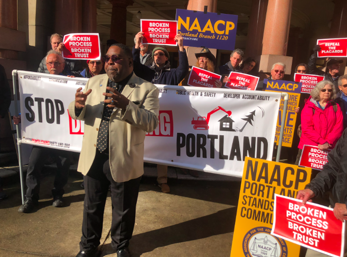 E.D. Mondaine, president of Portland’s NAACP chapter, speaks at a rally outside Portland City Hall Wednesday morning. E.D. Mondaine, president of Portland’s NAACP chapter, speaks at a rally outside Portland City Hall Wednesday morning.