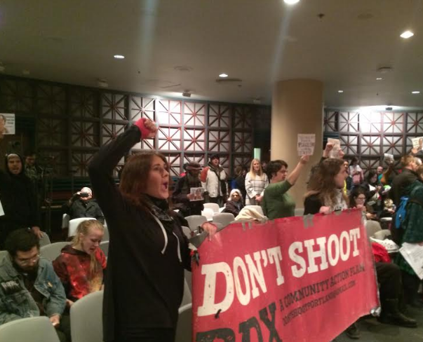 Demonstrators disrupt a Portland City Council meeting on Wednesday morning