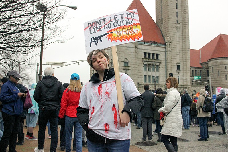 A student protests gun violence at St. Louis' March for Our Lives last month. - DANNY WICENTOWSKI