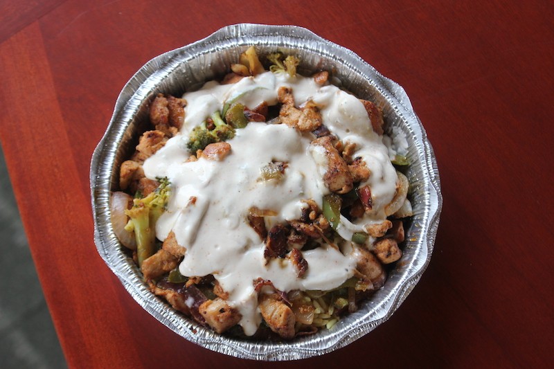 A chicken kebab lunch special with rice, vegetables and "white sauce." - SARAH FENSKE