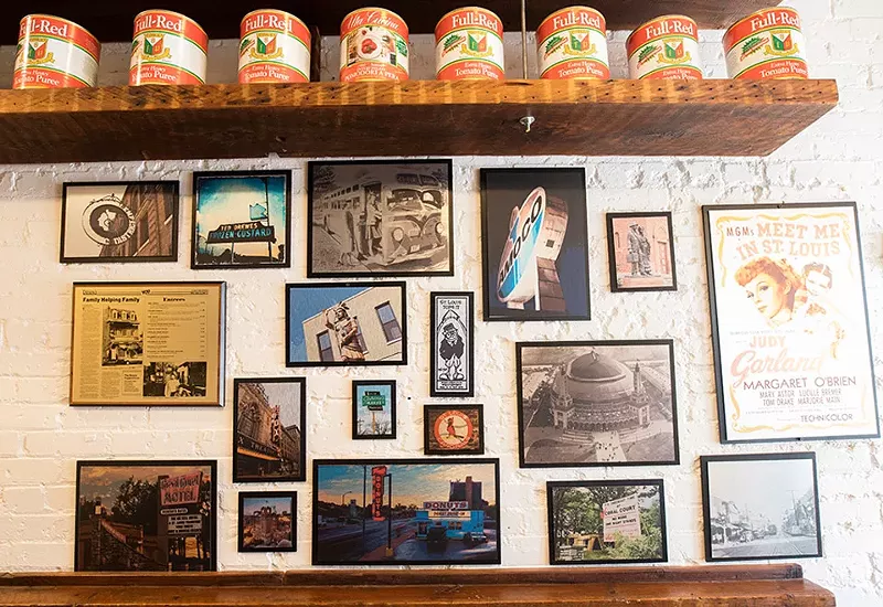 The storefront features St. Louis memorabilia. - MABEL SUEN