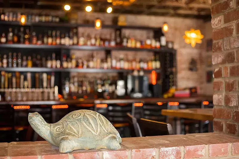 Stone Turtle takes its name from nearby Turtle Playground, with sculptures by Bob Cassilly. - MABEL SUEN