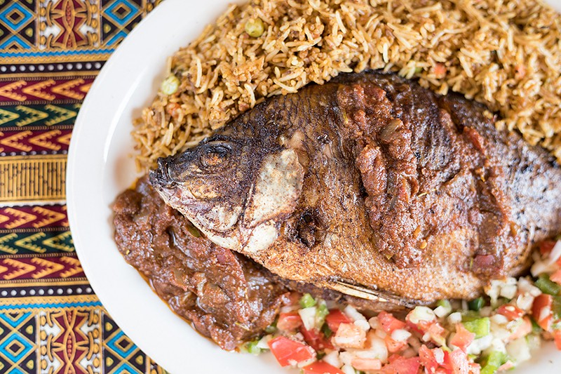 Whole tilapia is marinated in herbs and spices, then deep fried. - MABEL SUEN