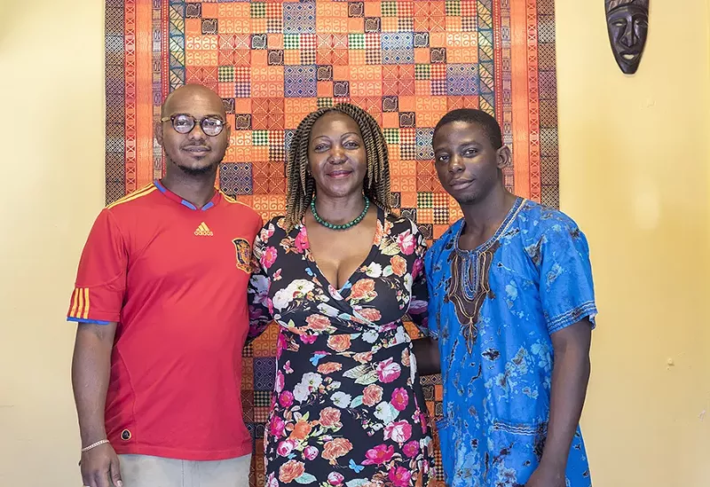 Chef Christine Mukulu Sseremba and her sons George Knudsen and Majesty Mukulu. - MABEL SUEN
