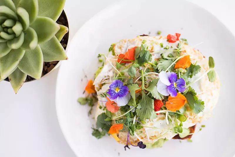 "Legumeamole" is served open-faced with an over-easy egg. - MABEL SUEN