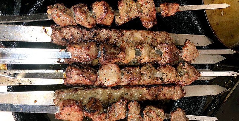 The mixed grill is chicken, lamb and beef kabobs served with rice and na'an for $19.99. - AMEEN AKBARZADA