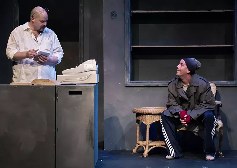 Mr. Barker (Zachary Allen Farmer) sells words to his best customer (Spencer Sickmann) in "Unabridged." - JUSTIN FOIZEY
