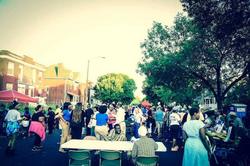 The neighborhood gathering included music and food from West End Grill & Pub. - NICHOLAS COULTER