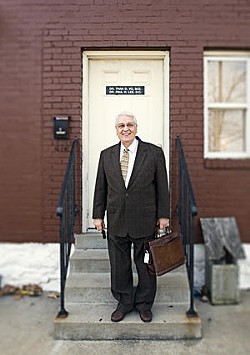 William Chignoli on the steps of ASC's clinic on South Grand - PHOTO BY JENNIFER SILVERBERG