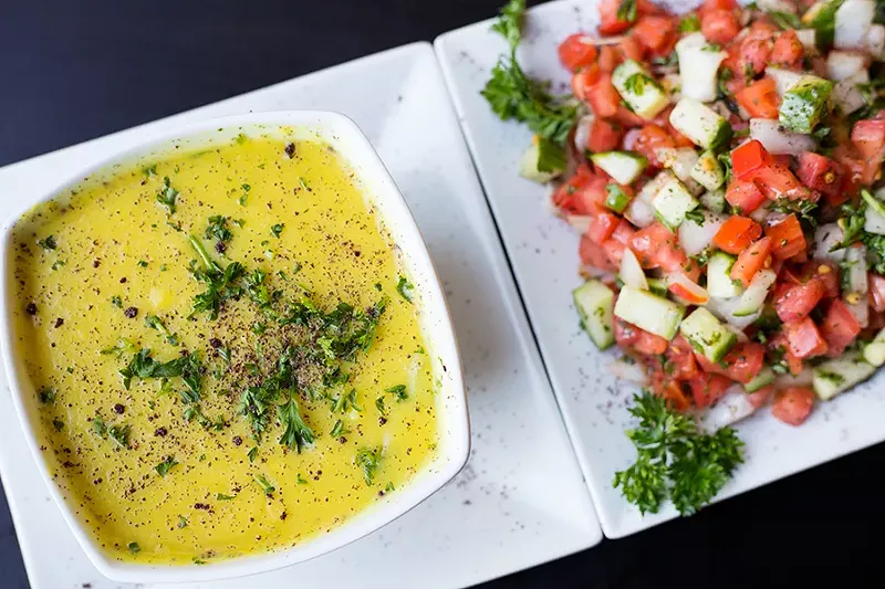 Lentil soup and "Aboud's salad": tomato, cucumber, onions, dry mint, olive oil and fresh lemon. - MABEL SUEN