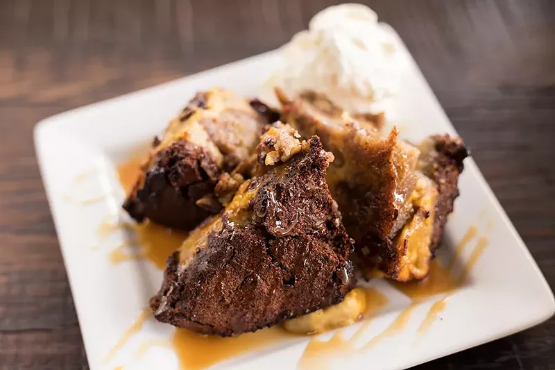 The bread pudding brunch entree features an apple pie potsticker and bourbon caramel. - MABEL SUEN