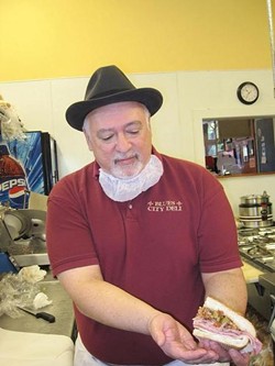 Vince Valenza making one of the Blues CIty Deli's famous sandwiches. - ROBIN WHEELER