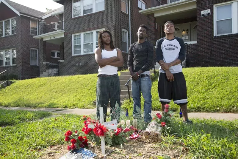 Franks with friends at the makeshift memorial for VonDerrit Myers in the Shaw neighborhood. - STEVE TRUESDELL