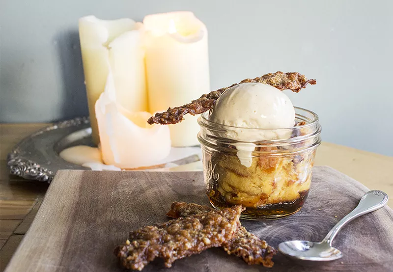 Maple-bacon bread pudding with a sugar waffle, bacon challah, maple custard and housemade apple-butter ice cream. - MABEL SUEN
