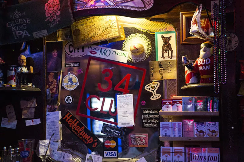 "Most of it is just crap and cobwebs," bar manager Mike Mullen says of the trinkets the bar has collected over the years. - ERIC FRAZIER