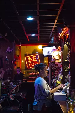 Lynn Rinker is the 34 Club's newest bartender. - ERIC FRAZIER