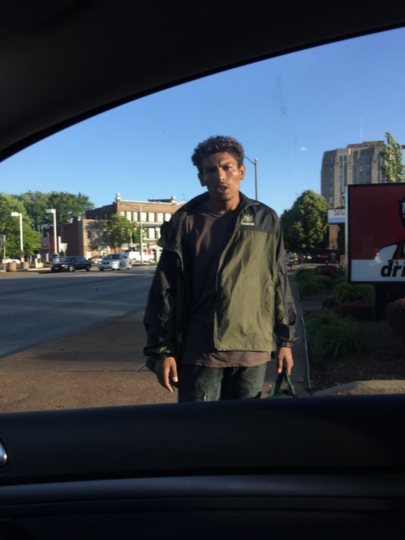 This man, shown in May, told motorists in a Taco Bell drive-thru he could fix dents in their cars, a witness says. - IMAGE VIA JULIAN KUSSMAN