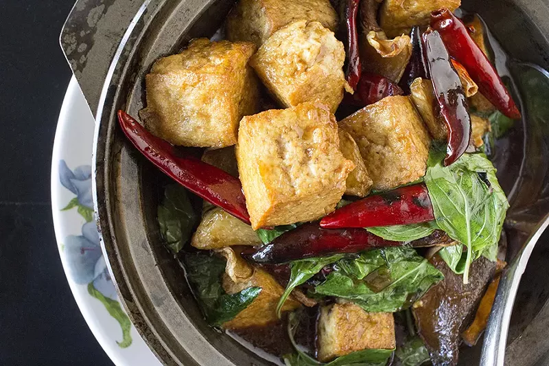 “Three Cup Tofu” is tossed in a sauce of rice wine vinegar, soy sauce and sesame oil. - PHOTO BY MABEL SUEN