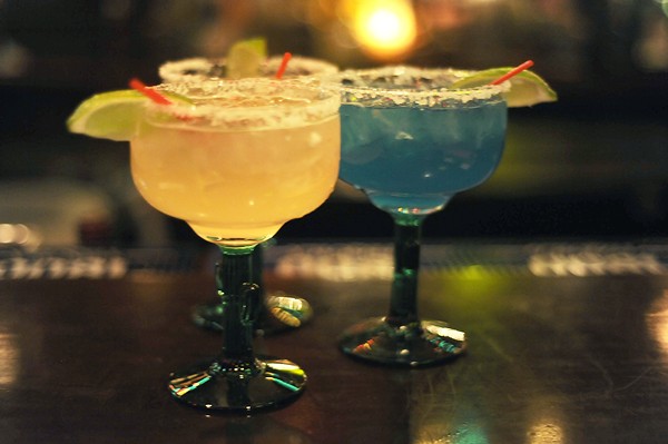 Margaritas at Pueblo Solis. For a twist, try the Blue Curacao. - PHOTO BY KELLY GLUECK