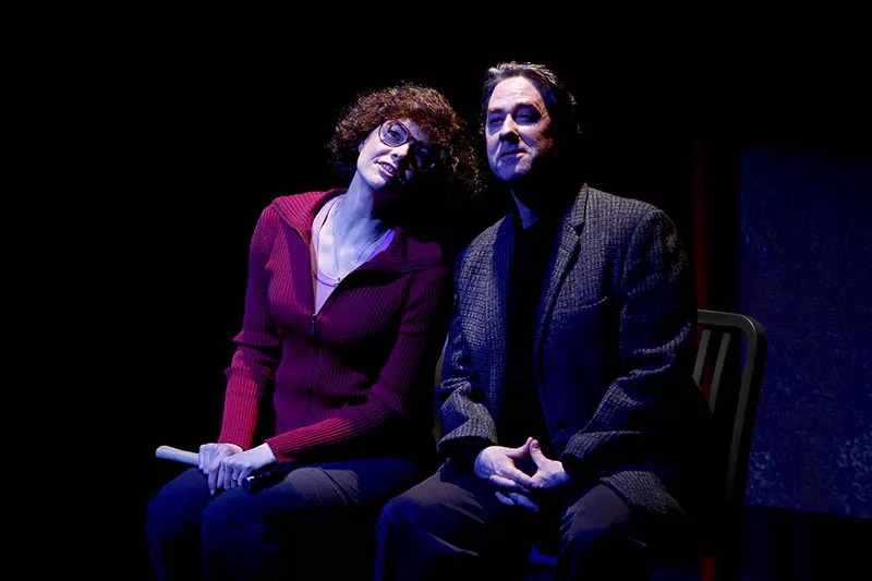 Molly (Nancy Bell) and Fr. Berrigan (Kevin Orton) discuss how they'll dismantle the atomic bomb. - PHOTO BY JERRY NAUNHEIM JR.