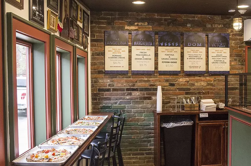 The interior of Melo's Pizzeria is tiny. - MABEL SUEN