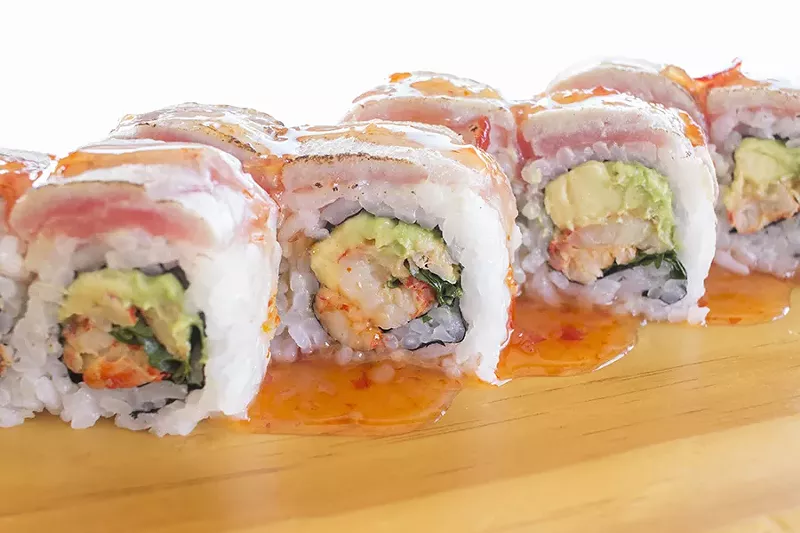 The "Fiesta Roll," which features tuna, avocado, cilantro, seared albacore and sweet chili sauce. - PHOTO BY MABEL SUEN